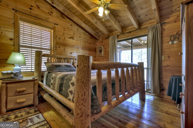 638 Cohutta Mountain Rd, Blue Ridge, GA 30513 - bedroom with wood ceiling, vaulted ceiling with beams, wood walls, and wood-type flooring