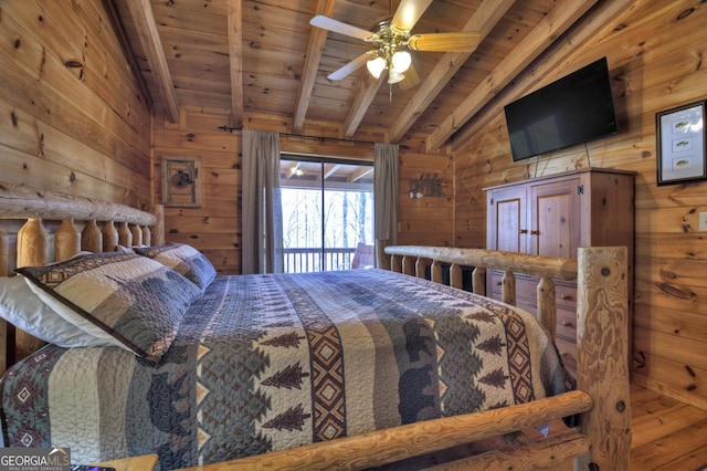 638 Cohutta Mountain Rd, Blue Ridge, GA 30513 - bedroom with wooden ceiling, wood walls, and vaulted ceiling with beams