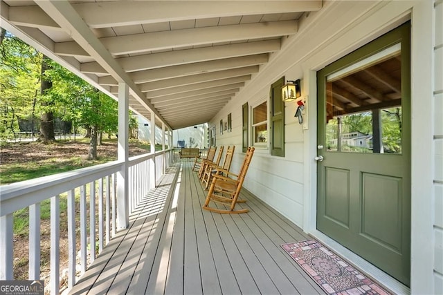 wooden terrace with covered porch
