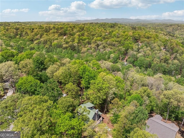 aerial view featuring a forest view