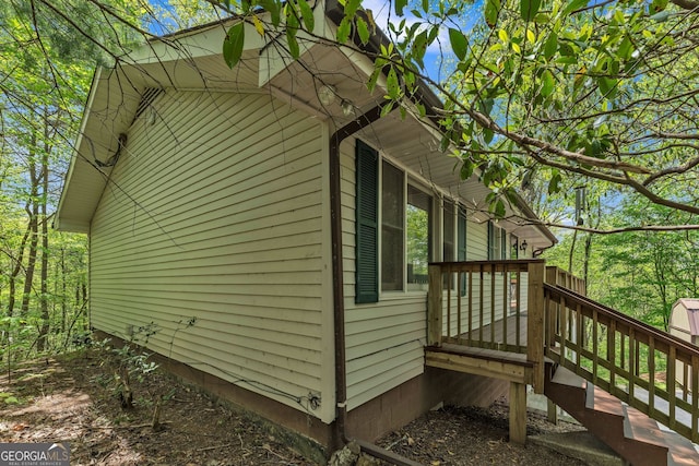 view of home's exterior with a deck