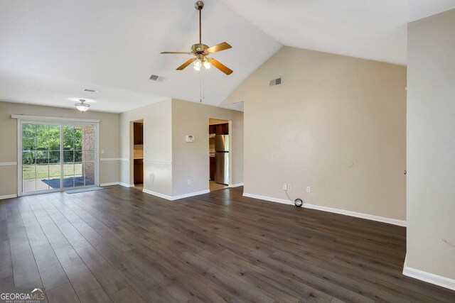 767 Madison Dr, Hinesville, GA 31313 - unfurnished living room with visible vents, dark wood-type flooring, baseboards, high vaulted ceiling, and ceiling fan