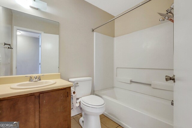 767 Madison Dr, Hinesville, GA 31313 - full bathroom featuring toilet, vanity, bathtub / shower combination, and tile patterned floors