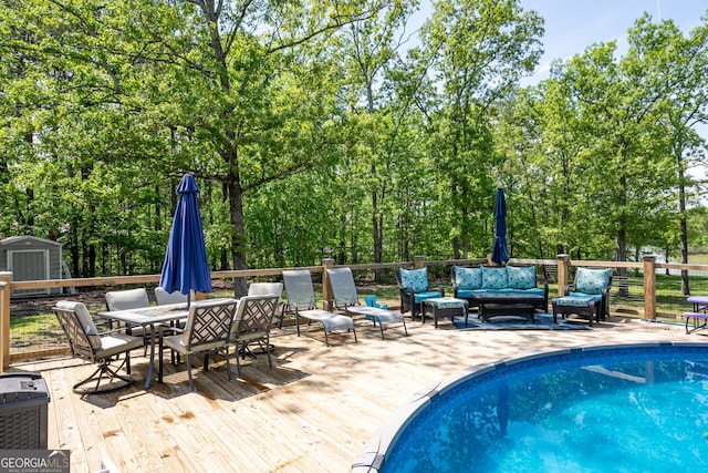 view of yard featuring a playground and an outdoor pool