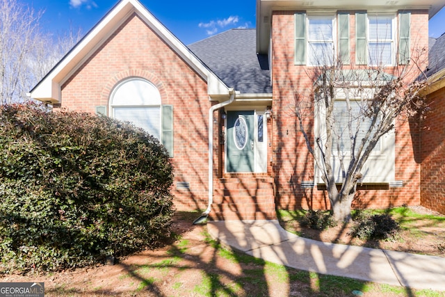 1191 Twelve Oaks Cir, Watkinsville, GA 30677 - view of front facade featuring brick siding and roof with shingles