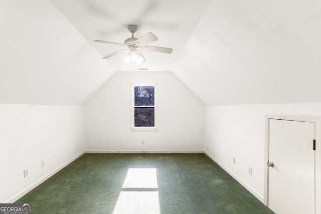 bonus room featuring vaulted ceiling, carpet, and baseboards