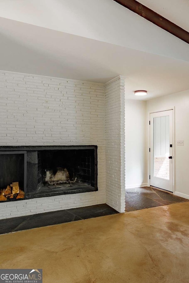 details featuring a fireplace, carpet floors, and baseboards