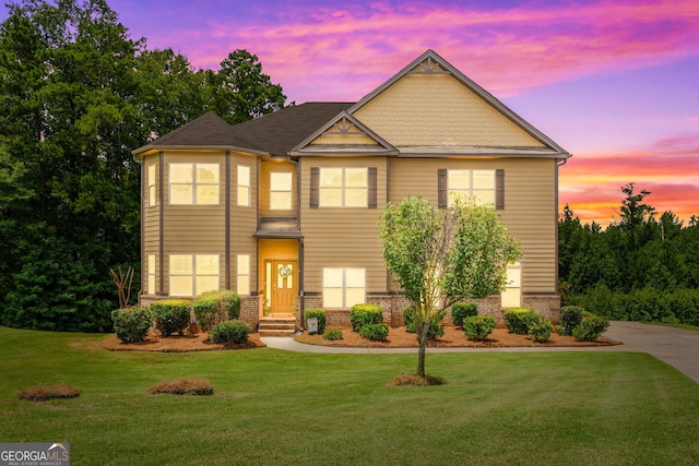 279 Sturry Dr, Mcdonough, GA 30252 - view of front facade with brick siding and a yard