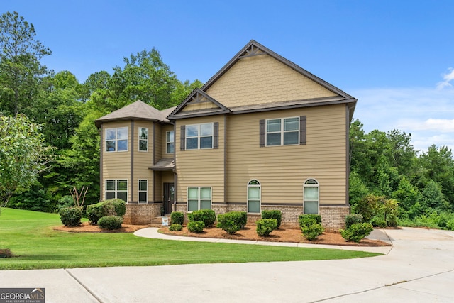 279 Sturry Dr, Mcdonough, GA 30252 - craftsman inspired home featuring a front lawn and brick siding