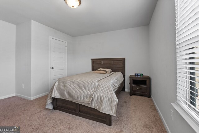 279 Sturry Dr, Mcdonough, GA 30252 - bedroom with carpet and baseboards