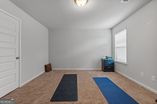 279 Sturry Dr, Mcdonough, GA 30252 - workout area featuring carpet floors and baseboards