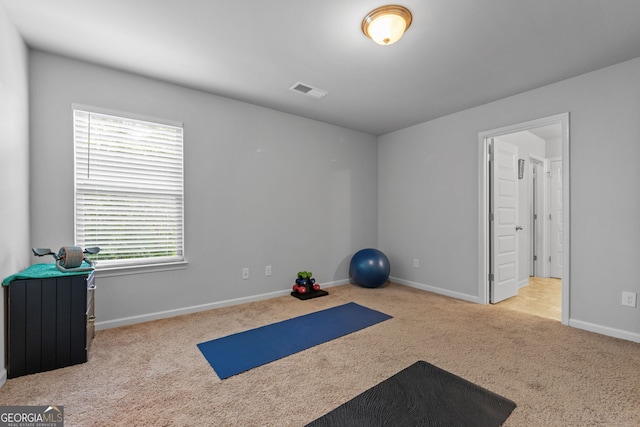 279 Sturry Dr, Mcdonough, GA 30252 - exercise room featuring carpet floors, visible vents, and baseboards