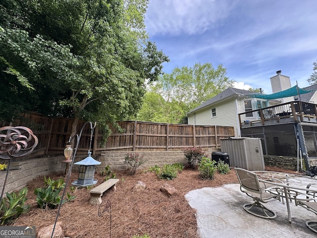 view of yard with a patio and a fenced backyard