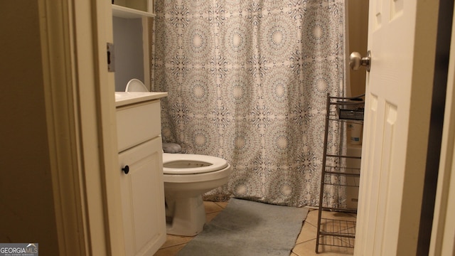 full bathroom with toilet, tile patterned floors, a shower with curtain, and vanity