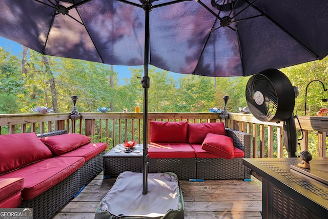 wooden deck with an outdoor hangout area