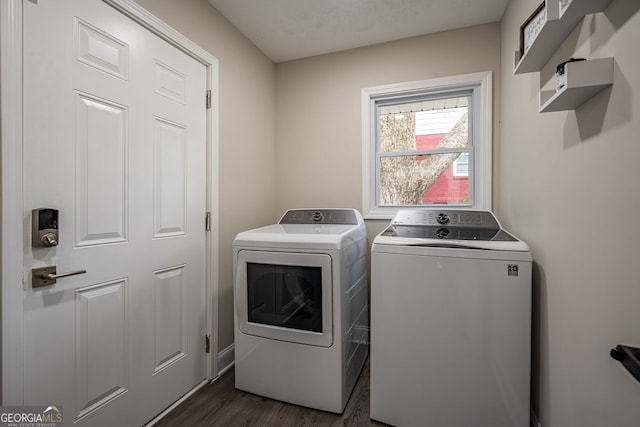 831 Catherine St, Forest Park, GA 30297 - washroom featuring laundry area, dark wood-style flooring, and washing machine and dryer