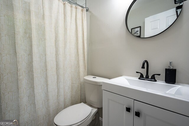 831 Catherine St, Forest Park, GA 30297 - bathroom featuring vanity and toilet