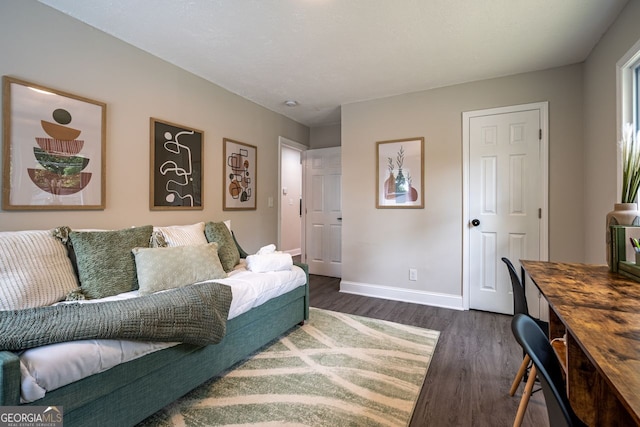 831 Catherine St, Forest Park, GA 30297 - living room with baseboards and dark wood-type flooring