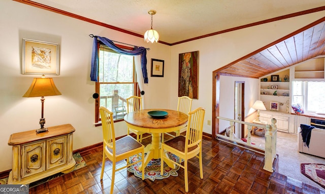 63 Eagle Chase Cir, Dillard, GA 30537 - dining space with baseboards, crown molding, built in features, and vaulted ceiling