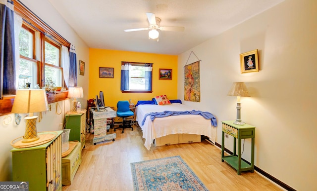 63 Eagle Chase Cir, Dillard, GA 30537 - bedroom featuring light wood-type flooring, baseboards, and ceiling fan