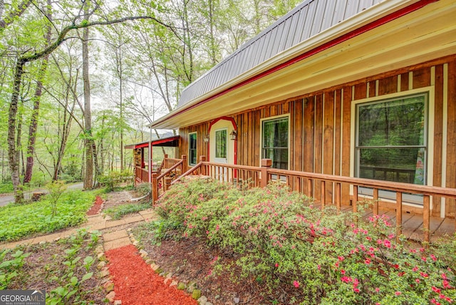 63 Eagle Chase Cir, Dillard, GA 30537 - entrance to property with a porch, board and batten siding, and metal roof