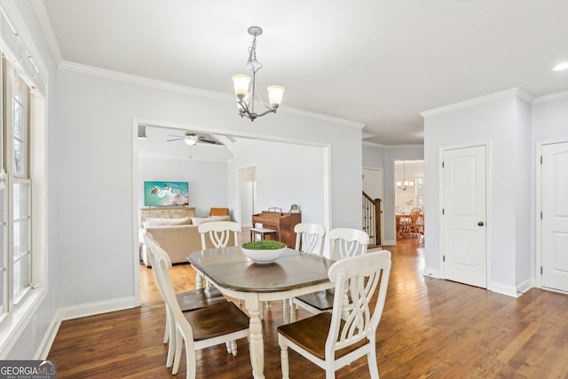 108 Turnberry Trce, Sharpsburg, GA 30277 - dining room with a chandelier, wood finished floors, plenty of natural light, ornamental molding, and a ceiling fan