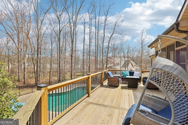 108 Turnberry Trce, Sharpsburg, GA 30277 - wooden terrace featuring outdoor lounge area, a sunroom, and a fenced backyard