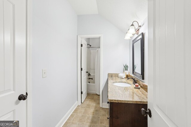 108 Turnberry Trce, Sharpsburg, GA 30277 - full bath with vanity, vaulted ceiling, and shower / tub combo
