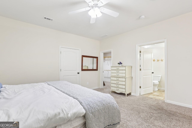 108 Turnberry Trce, Sharpsburg, GA 30277 - carpeted bedroom with ensuite bathroom and a ceiling fan
