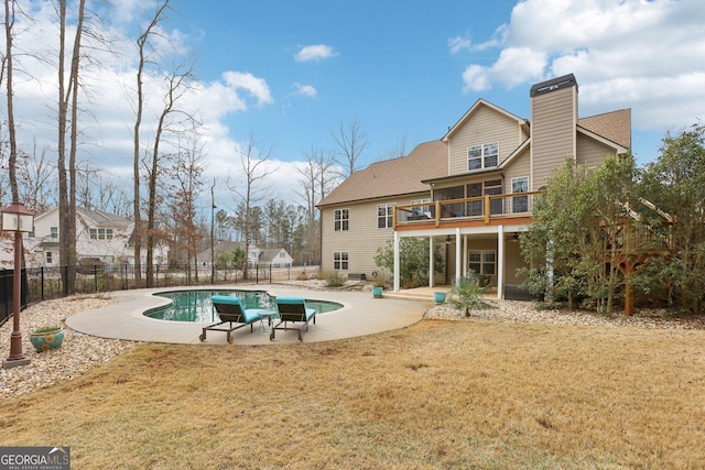 108 Turnberry Trce, Sharpsburg, GA 30277 - view of swimming pool featuring a patio, a fenced backyard, and a deck