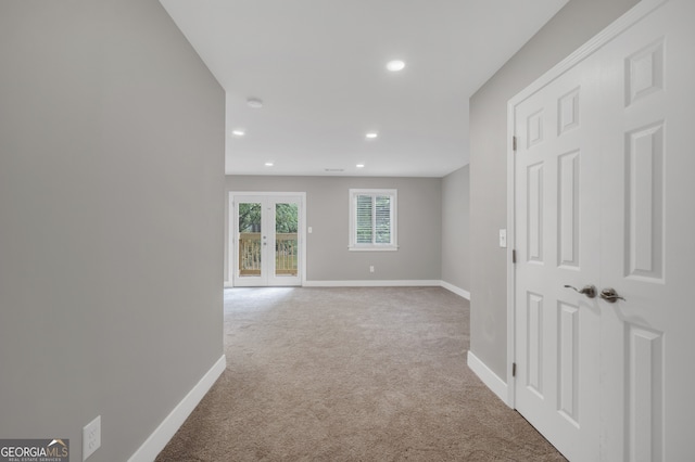 hallway featuring carpet, french doors, recessed lighting, and baseboards