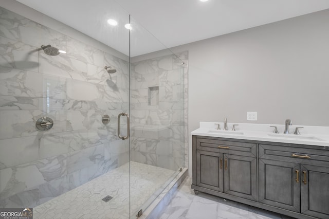 full bathroom featuring a shower stall, recessed lighting, marble finish floor, and a sink