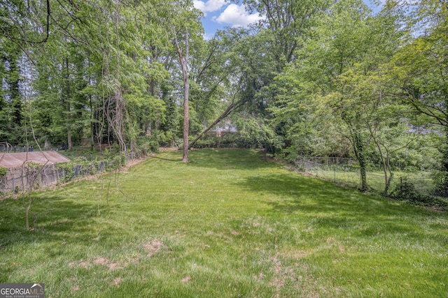 view of yard featuring fence
