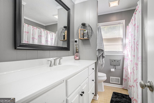 205 Tamea Trl, Covington, GA 30014 - bathroom with vanity, toilet, ornamental molding, and a textured ceiling