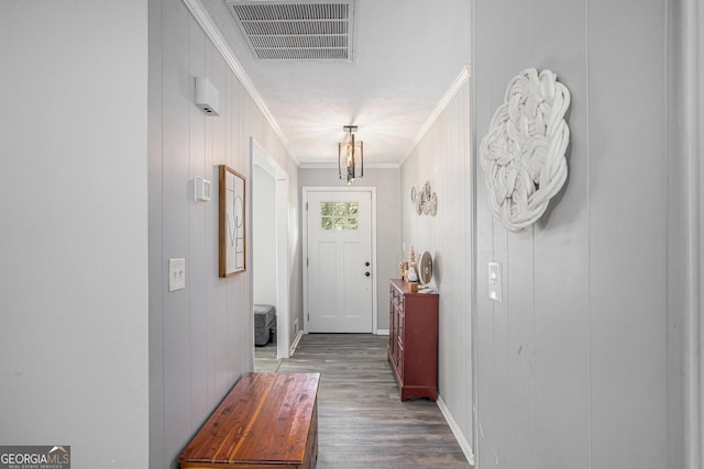 205 Tamea Trl, Covington, GA 30014 - doorway with crown molding and wood finished floors