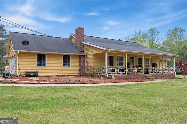 255 Deer Run Rd, Ellenwood, GA 30294 - back of house with a chimney, a yard, and a porch