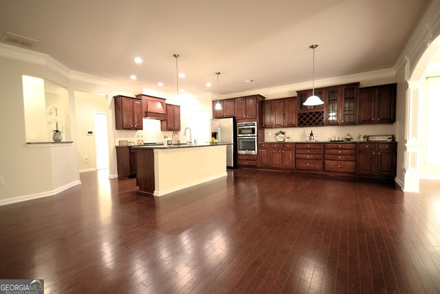 1142 Terrasol Rdg SW, Lilburn, GA 30047 - kitchen featuring recessed lighting, decorative light fixtures, crown molding, baseboards, and appliances with stainless steel finishes