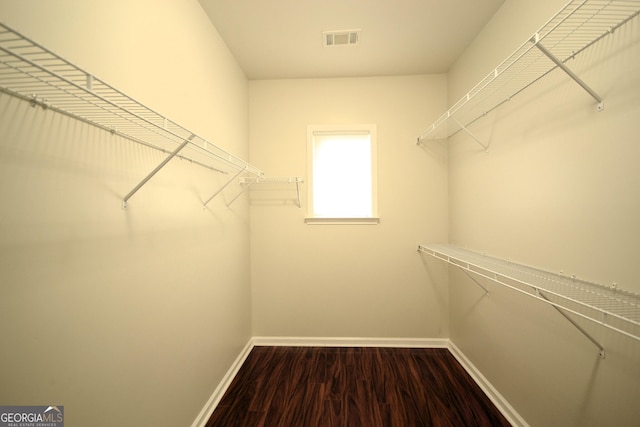 1142 Terrasol Rdg SW, Lilburn, GA 30047 - walk in closet with visible vents and dark wood finished floors
