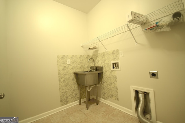 1142 Terrasol Rdg SW, Lilburn, GA 30047 - laundry room featuring baseboards, hookup for a washing machine, electric dryer hookup, laundry area, and light tile patterned floors