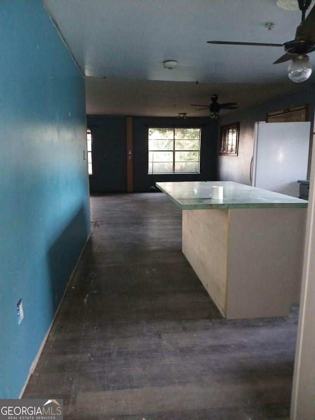 745 Harmony Church Rd, Colquitt, GA 39837 - hall with dark wood-type flooring and baseboards