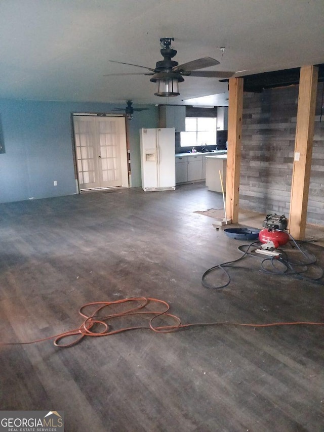 745 Harmony Church Rd, Colquitt, GA 39837 - unfurnished living room featuring a ceiling fan and wood finished floors