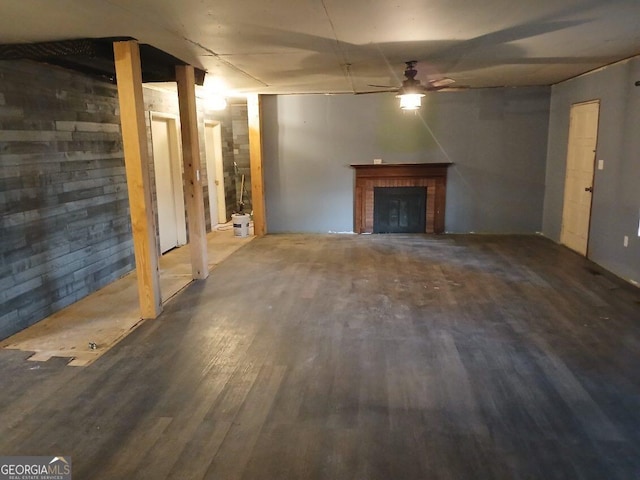 745 Harmony Church Rd, Colquitt, GA 39837 - below grade area featuring wood finished floors, ceiling fan, and a fireplace