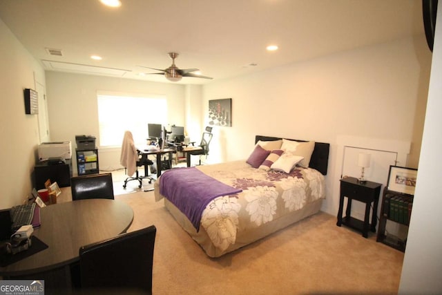 bedroom with visible vents, attic access, carpet flooring, and recessed lighting