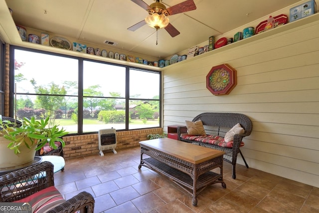 171 Wynn Dr, Hampton, GA 30228 - sunroom with heating unit and a ceiling fan