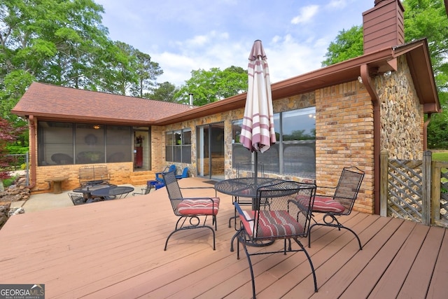 171 Wynn Dr, Hampton, GA 30228 - wooden deck featuring outdoor dining space