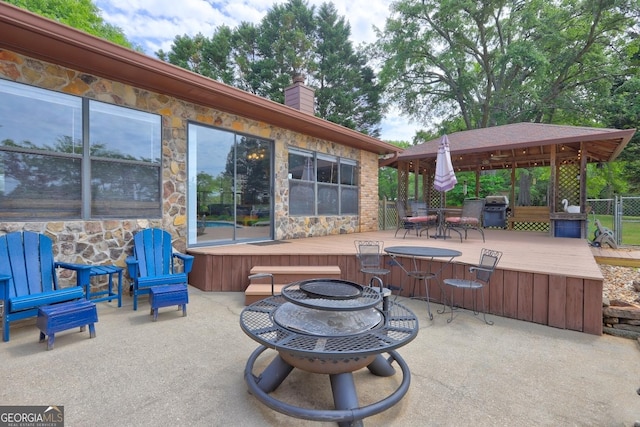171 Wynn Dr, Hampton, GA 30228 - view of patio / terrace featuring area for grilling, a deck, a gazebo, fence, and a fire pit