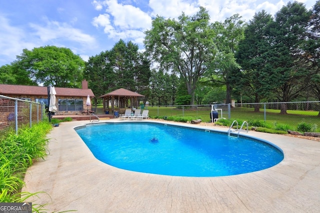 171 Wynn Dr, Hampton, GA 30228 - community pool with a gazebo, fence, and a patio area
