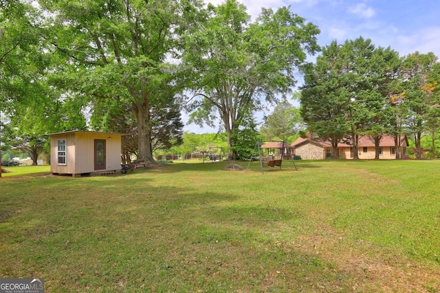 171 Wynn Dr, Hampton, GA 30228 - view of yard featuring a storage shed and an outdoor structure