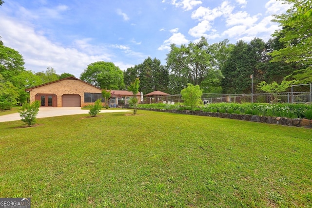 171 Wynn Dr, Hampton, GA 30228 - view of yard with fence and concrete driveway