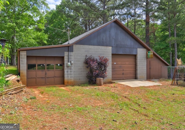 171 Wynn Dr, Hampton, GA 30228 - detached garage featuring fence